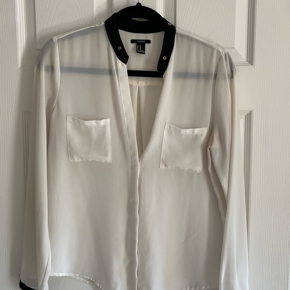 White bottom down with black and gold collar
